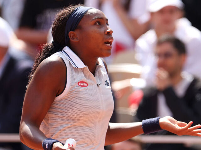 PARIS, FRANCE - JUNE 06: Coco Gauff of United States reacts with the umpire against Iga Swiatek of Poland during the Women's Singles Semi-Final match on Day 12 at Roland Garros on June 06, 2024 in Paris, France.