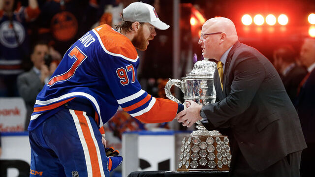 EDMONTON, CANADA - JUNE 02: NHL Deputy Commissioner Bill Daly congratulates Connor McDavid #97 of the Edmonton Oilers after Edmonton beat the Dallas Stars 2-1 in Game Six of the Western Conference Final of the 2024 Stanley Cup Playoffs at Rogers Place on June 02, 2024 in Edmonton, Alberta, Canada.