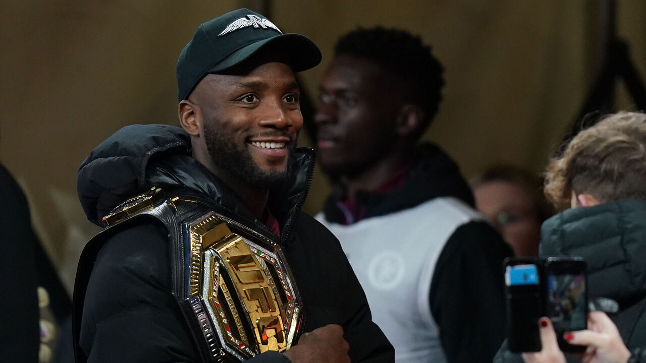 UFC Welterweight Champion Leon Edwards on the pitch at half time during the Premier League match at Villa Park, Birmingham. Picture date: Saturday December 30, 2023.