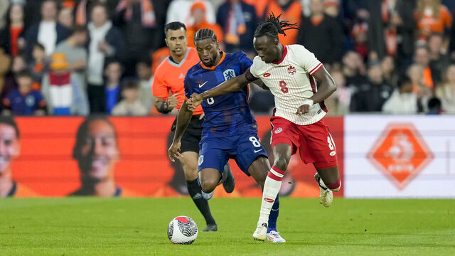 ROTTERDAM, NETHERLANDS - JUNE 6: Georginio Wijnaldum of Netherlands and Ismael Koné of Canada battle for the ball during the international friendly match between Netherlands and Canada at De Kuip on June 6, 2024 in Rotterdam, Netherlands.