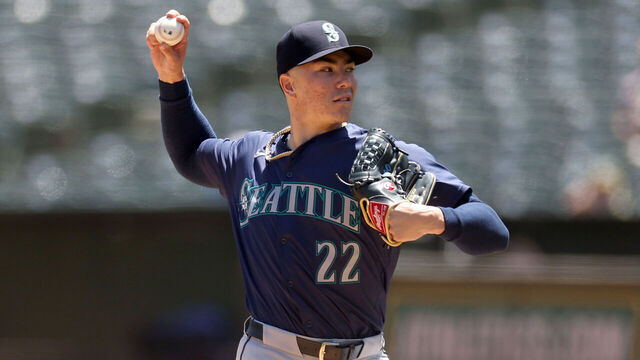 OAKLAND, CALIFORNIA - JUNE 06: Bryan Woo #22 of the Seattle Mariners pitches against the Oakland Athletics in the first inning at Oakland Coliseum on June 6, 2024 in Oakland, California.