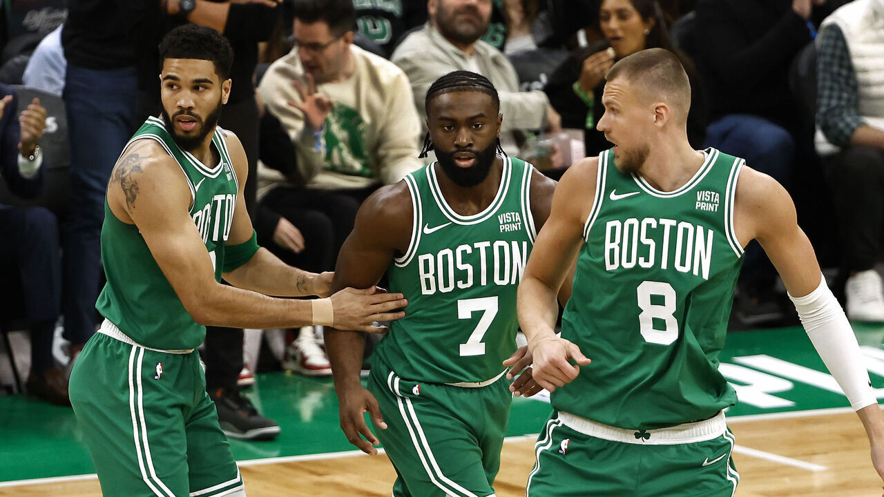 BOSTON, MA - APRIL 24: Jayson Tatum #0 of the Boston Celtics, left, Jaylen Brown #7 and Kristaps Porzingis #8 during the first quarter of game two of the Eastern Conference First Round Playoffs against the Miami Heat at TD Garden on April 24, 2024 in Boston, Massachusetts. NOTE TO USER: User expressly acknowledges and agrees that, by downloading and/or using this Photograph, user is consenting to the terms and conditions of the Getty Images License Agreement.