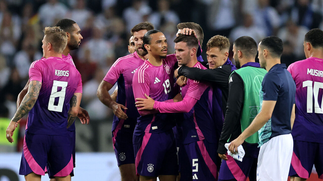 MOENCHENGLADBACH, GERMANY - JUNE 07: Pascal Gross and Leroy Sane of Germany celebrates following the team's victory in the international friendly match between Germany and Greece at Borussia Park Stadium on June 07, 2024 in Moenchengladbach, Germany.