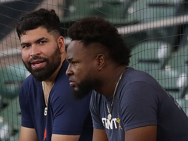 HOUSTON, TEXAS - JULY 29: (L-R) Luis Garcia of the Houston Astros, Jose Urquidy, and Cristian Javier during warm-ups before playing the Tampa Bay Rays at Minute Maid Park on July 29, 2023 in Houston, Texas.