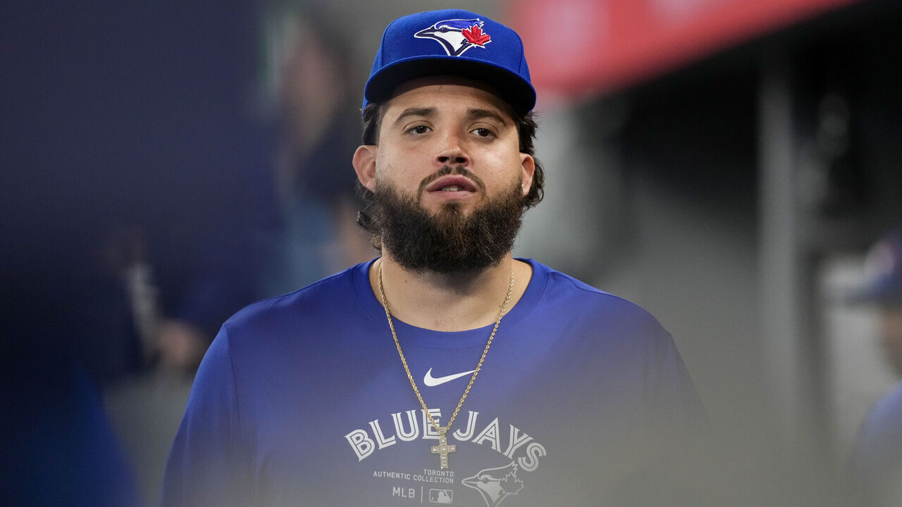 TORONTO, ON - APRIL 9: Alex Manoah #6 of the Toronto Blue Jays looks on from the dugout against the Seattle Mariners at the Rogers Centre on April 9, 2024 in Toronto, Ontario, Canada.