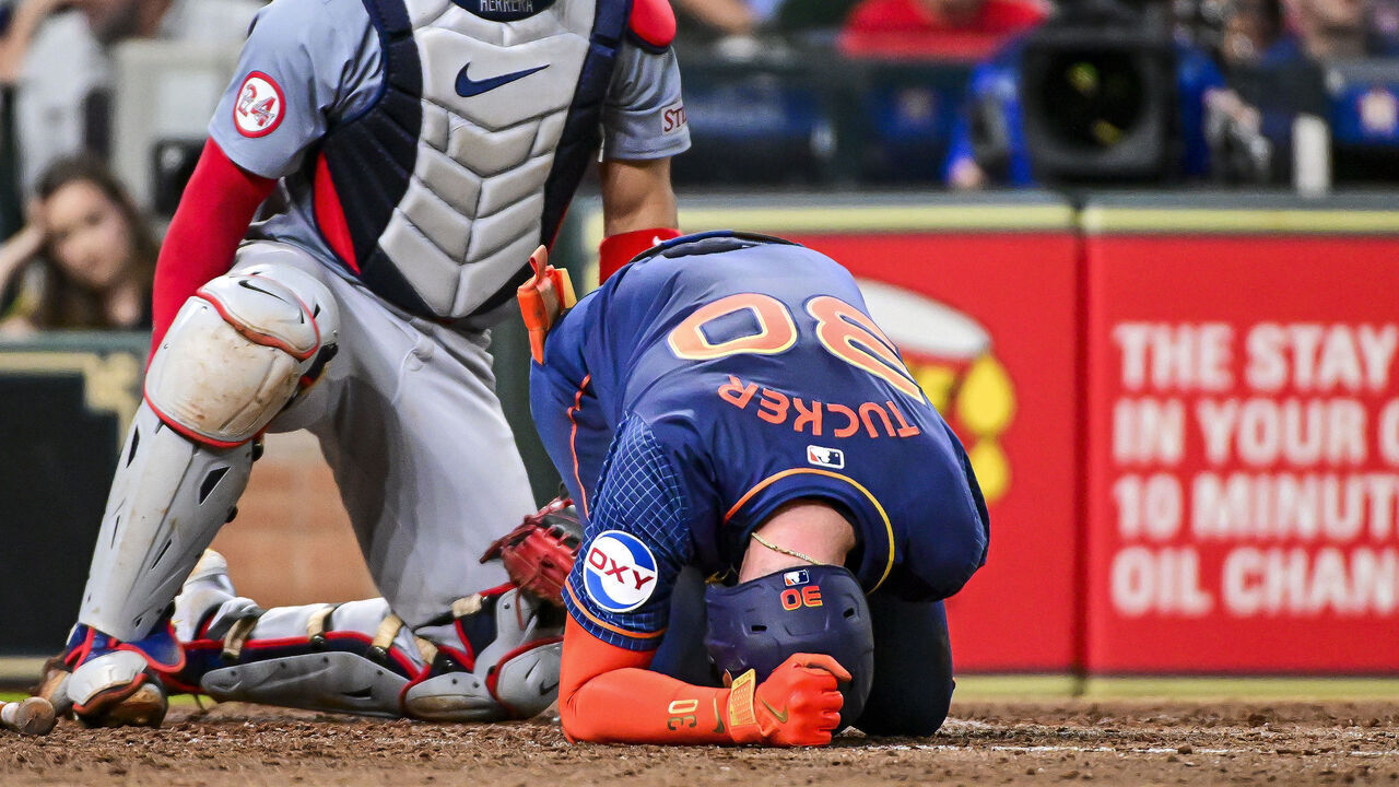 HOUSTON, TEXAS - JUNE 03: Kyle Tucker #30 of the Houston Astros reacts after being hit by a pitch in the third inning against the St. Louis Cardinals at Minute Maid Park on June 03, 2024 in Houston, Texas.