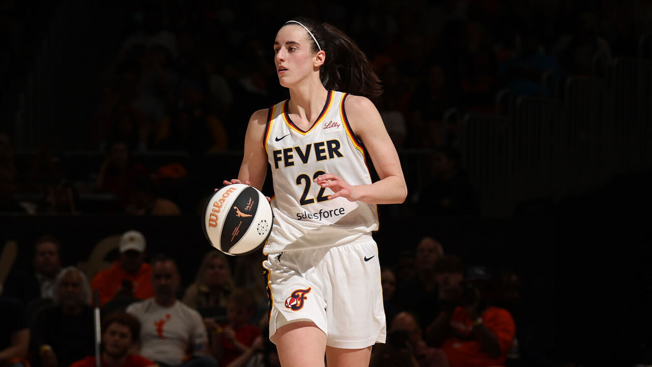 WASHINGTON, D.C. - JUNE 7: Caitlin Clark #22 of the Indiana Fever handles the ball during the game against the Washington Mystics during a 2024 Commissioner's Cup game on June 7, 2024 at Entertainment and Sports Arena in Washington, D.C. Mandatory Copyright Notice: Copyright 2024 NBAE