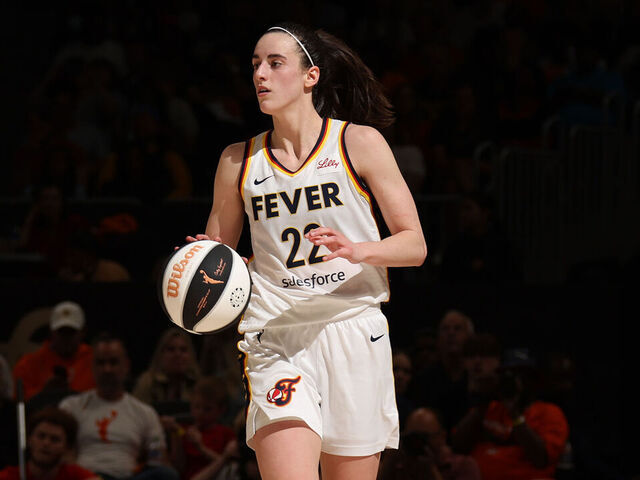 WASHINGTON, D.C. - JUNE 7: Caitlin Clark #22 of the Indiana Fever handles the ball during the game against the Washington Mystics during a 2024 Commissioner's Cup game on June 7, 2024 at Entertainment and Sports Arena in Washington, D.C. Mandatory Copyright Notice: Copyright 2024 NBAE