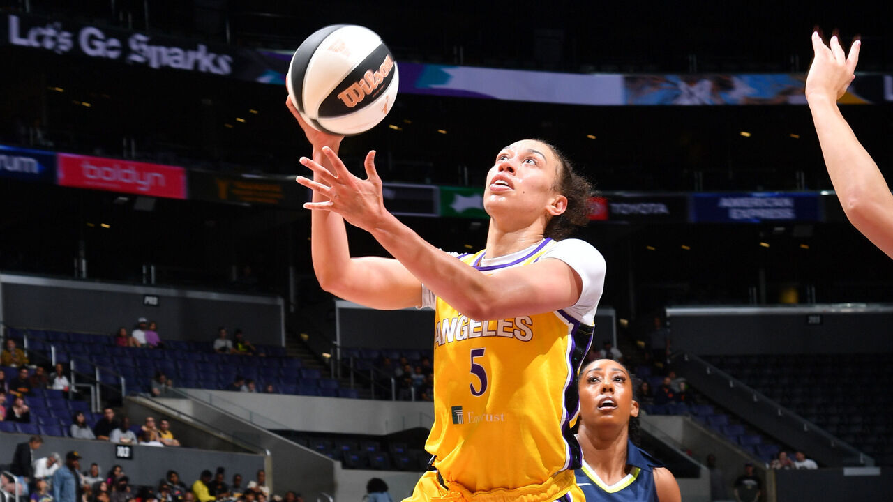 LOS ANGELES, CA - JUNE 7: Dearica Hamby #5 of the Los Angeles Sparks drives to the basket during the game against the Dallas Wings during a 2024 Commissioner's Cup game on June 7, 2024 at Crypto.com Arena in Los Angeles, California. NOTE TO USER: User expressly acknowledges and agrees that, by downloading and/or using this Photograph, user is consenting to the terms and conditions of the Getty Images License Agreement. Mandatory Copyright Notice: Copyright 2024 NBAE