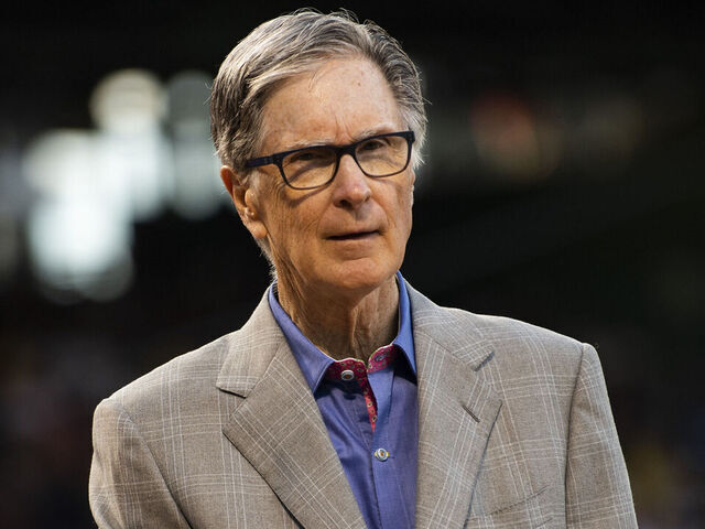 BOSTON, MA - JULY 26: Boston Red Sox Principal Owner John Henry looks on during a pre-game ceremony in recognition of the National Baseball Hall of Fame induction of former Former Boston Red Sox player David Ortiz before a game between the Boston Red Sox and the Cleveland Guardians on July 26, 2022 at Fenway Park in Boston, Massachusetts.