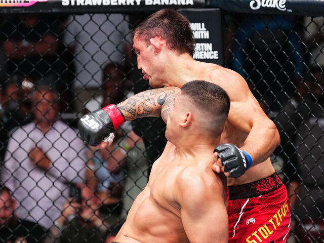 LOUISVILLE, KENTUCKY - JUNE 08: (L-R) Brunno Ferreira of Brazil knocks out Dustin Stoltzfus in a middleweight fight during the UFC Fight Night event at KFC YUM! Center on June 08, 2024 in Louisville, Kentucky.