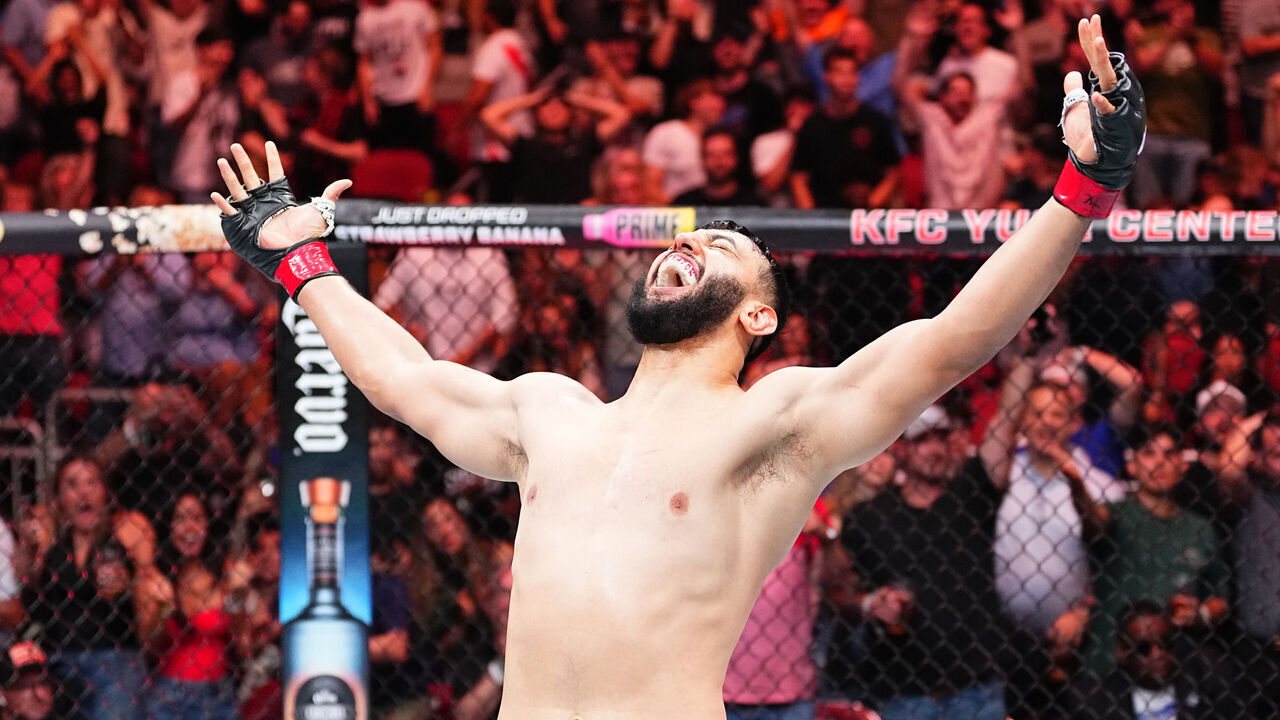 LOUISVILLE, KENTUCKY - JUNE 08: Dominick Reyes reacts after his knockout victory against Dustin Jacoby in a light heavyweight fight during the UFC Fight Night event at KFC YUM! Center on June 08, 2024 in Louisville, Kentucky.