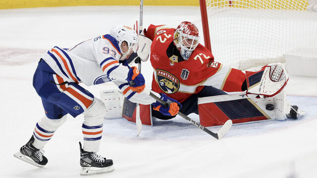 SUNRISE, FLORIDA - JUNE 08: Sergei Bobrovsky #72 of the Florida Panthers makes a save against Ryan Nugent-Hopkins #93 of the Edmonton Oilers during the first period in Game One of the 2024 Stanley Cup Final at Amerant Bank Arena on June 08, 2024 in Sunrise, Florida.