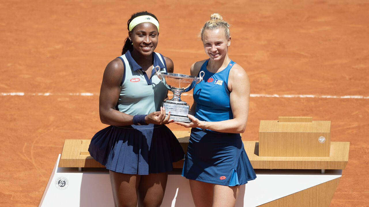 PARIS, FRANCE - June 09: Coco Gauff of the United States and Katerina Siniakova of the Czech Republic with the winner's trophy after their victory against Sara Errani and Jasmine Paolini of Italy on Court Philippe-Chatrier during the Women's Doubles Final at the 2024 French Open Tennis Tournament at Roland Garros on June 9th, 2024, in Paris, France.