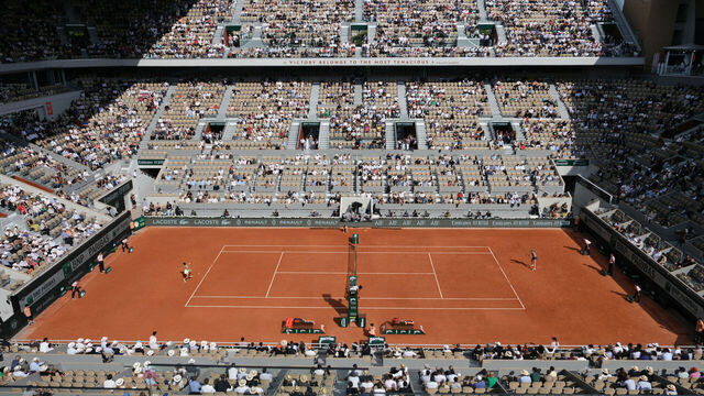 This photograph shows a view of Court Philippe-Chatrier as Italy's Jasmine Paolini (centre L) and Russia's Mirra Andreeva play their women's singles semi final match on day twelve of the French Open tennis tournament at the Roland Garros Complex in Paris on June 6, 2024.