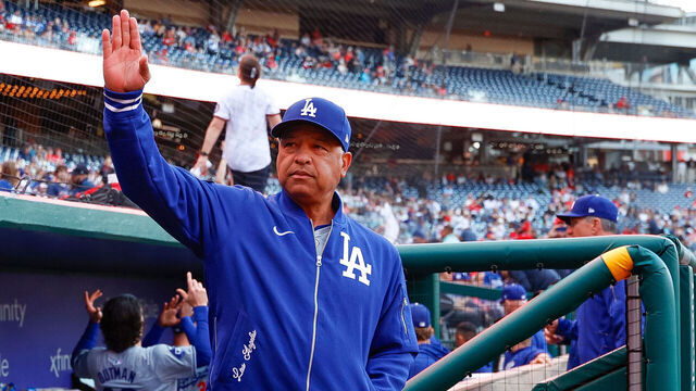 WASHINGTON, DC - APRIL 24: Manager Dave Roberts #30 of the Los Angeles Dodgers waves to fans prior to the start of a game against the Washington Nationals at Nationals Park on April 24, 2024 in Washington, DC.