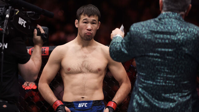 LAS VEGAS, NEVADA - DECEMBER 16: Shavkat Rakhmonov of Kazakhstan enters the octagon to start a welterweight fight against Stephen Thompson of the United States during the UFC 296: Edwards vs. Covington event at T-Mobile Arena on December 16, 2023 in Las Vegas, Nevada.