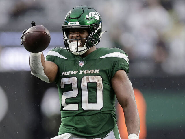 EAST RUTHERFORD, NEW JERSEY - DECEMBER 10: (NEW YORK DAILIES OUT) Breece Hall #20 of the New York Jets in action against the Houston Texans at MetLife Stadium on December 10, 2023 in East Rutherford, New Jersey. The Jets defeated the Texans 30-6.
