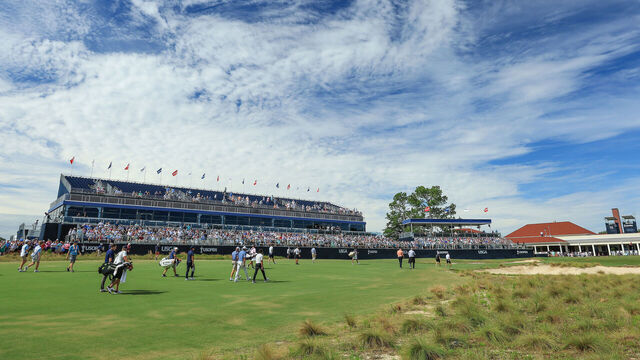 PINEHURST, NORTH CAROLINA - JUNE 10: Tiger Woods of The United States and his playing partners Jordan Spieth, Justin Thomas and Rickie Fowler approach the 18th green during practice prior to the 2024 U.S. Open on the No.2 Course at The Pinehurst Resort on June 10, 2024 in Pinehurst, North Carolina.