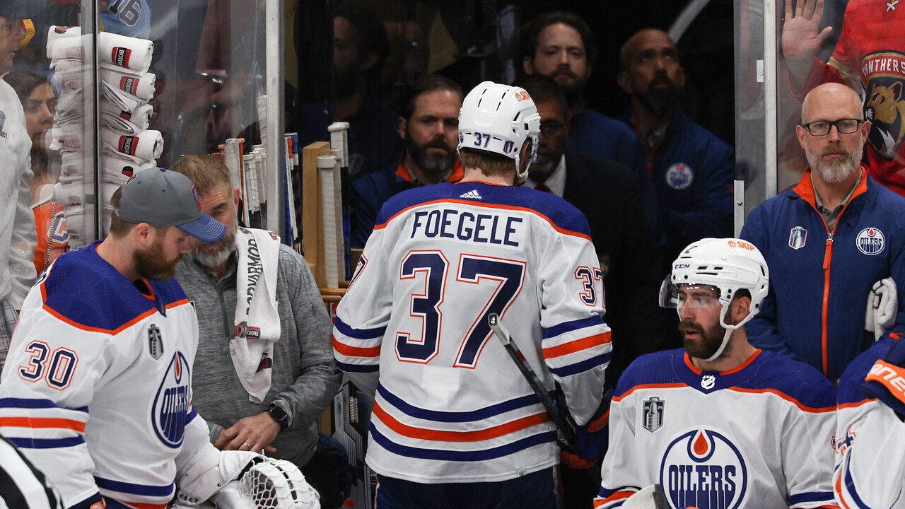 SUNRISE, FLORIDA - JUNE 10: Warren Foegele #37 of the Edmonton Oilers leaves the ice after being issued a game misconduct penalty after his hit on Eetu Luostarinen (not pictured) of the Florida Panthers during the first period in Game Two of the 2024 Stanley Cup Final at Amerant Bank Arena on June 10, 2024 in Sunrise, Florida.
