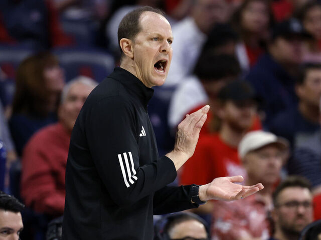 TUCSON, ARIZONA - FEBRUARY 24: Head coach Mike Hopkins of the Washington Huskies watches the action during the game against the Arizona Wildcats at McKale Center on February 24, 2024 in Tucson, Arizona. The Wildcats defeated the Huskies 91-75.