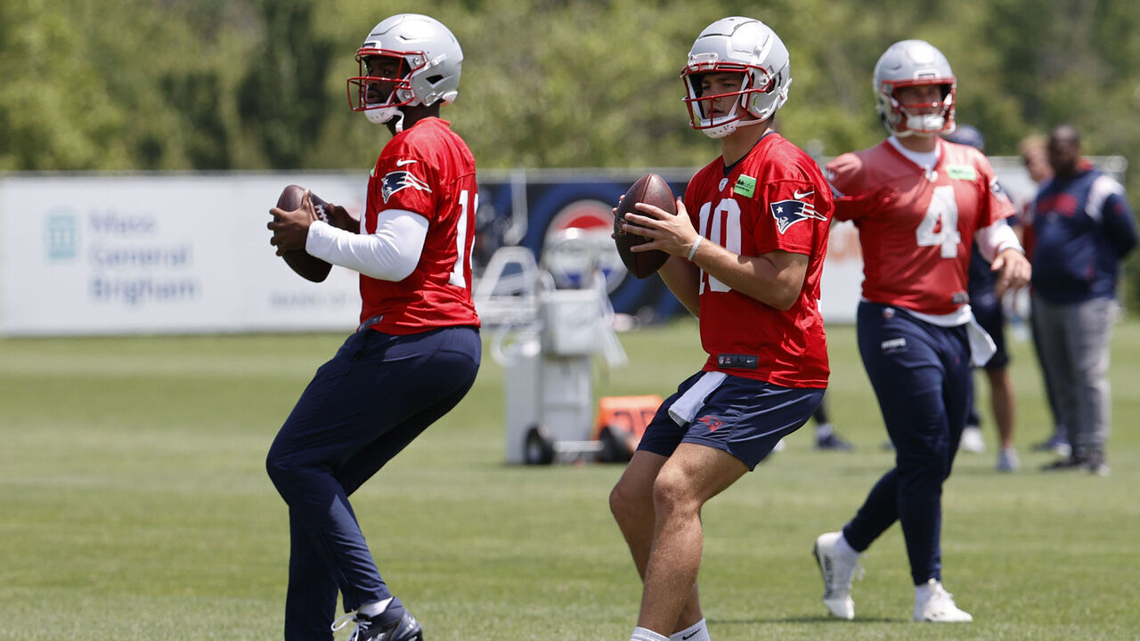 FOXBOROUGH, MA - JUNE 04: New England Patriots quarterbacks Jacoby Brissett (14) and Drake Maye (10) drop back during New England Patriots OTA on June 4, 2024, at Gillette Stadium in Foxborough, Massachusetts.