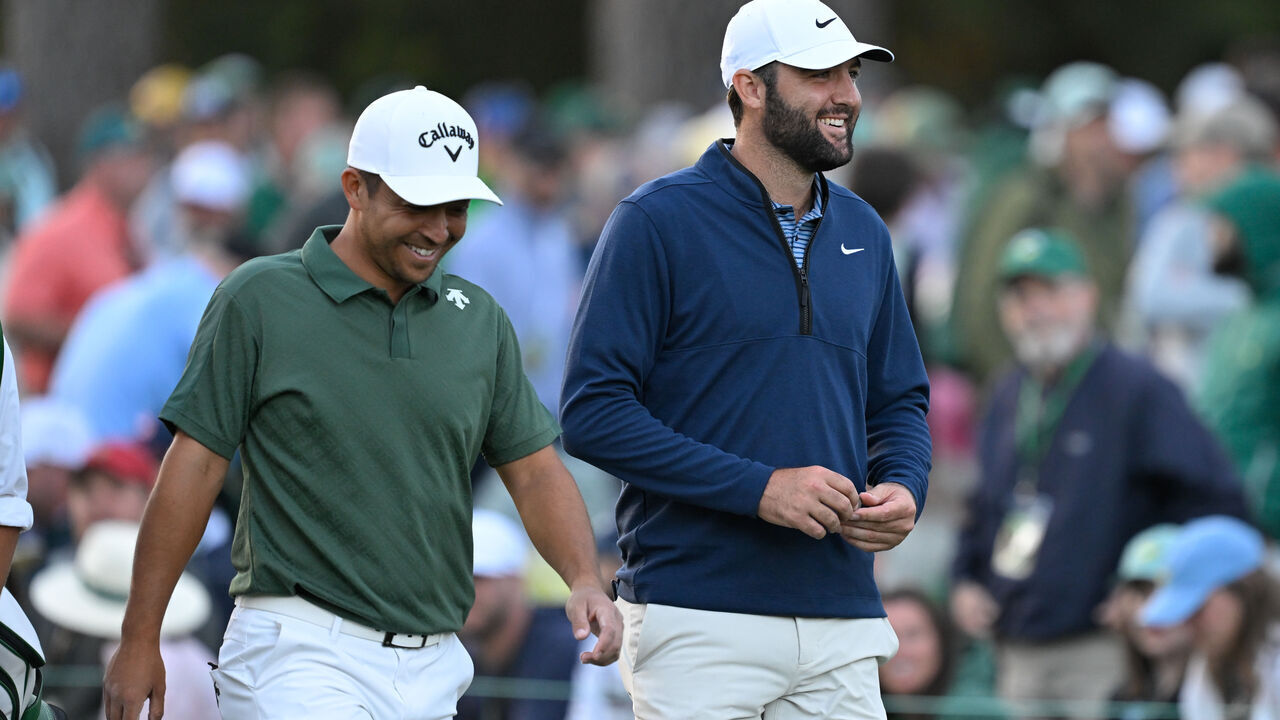 AUGUSTA, GEORGIA - APRIL 12: Scottie Scheffler and Xander Schauffele laugh together while walking off the 17th tee box during the second round of Masters Tournament at Augusta National Golf Club on April 12, 2024 in Augusta, Georgia.