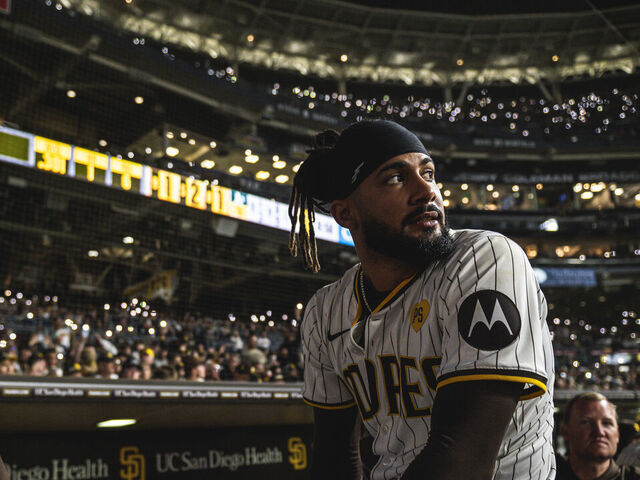 SAN DIEGO, CALIFORNIA - JUNE 10: Fernando Tatis Jr. #23 of the San Diego Padres sits in the dugout after the stadium lights had gone out in the seventh inning against the Oakland Athletics at Petco Park on June 10, 2024 in San Diego, California.