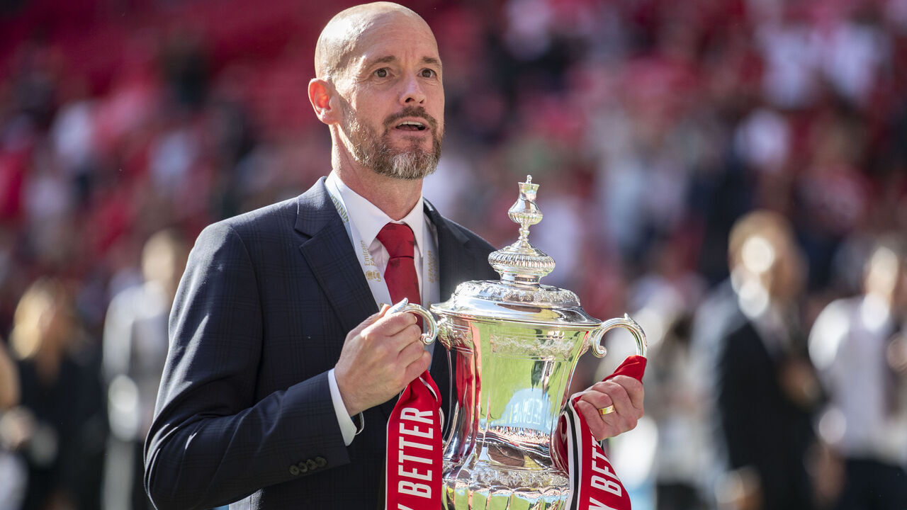 Manchester United manager Erik ten Hag is holding the FA Cup during the FA Cup Final between Manchester City and Manchester United at Wembley Stadium in London, on May 25, 2024.