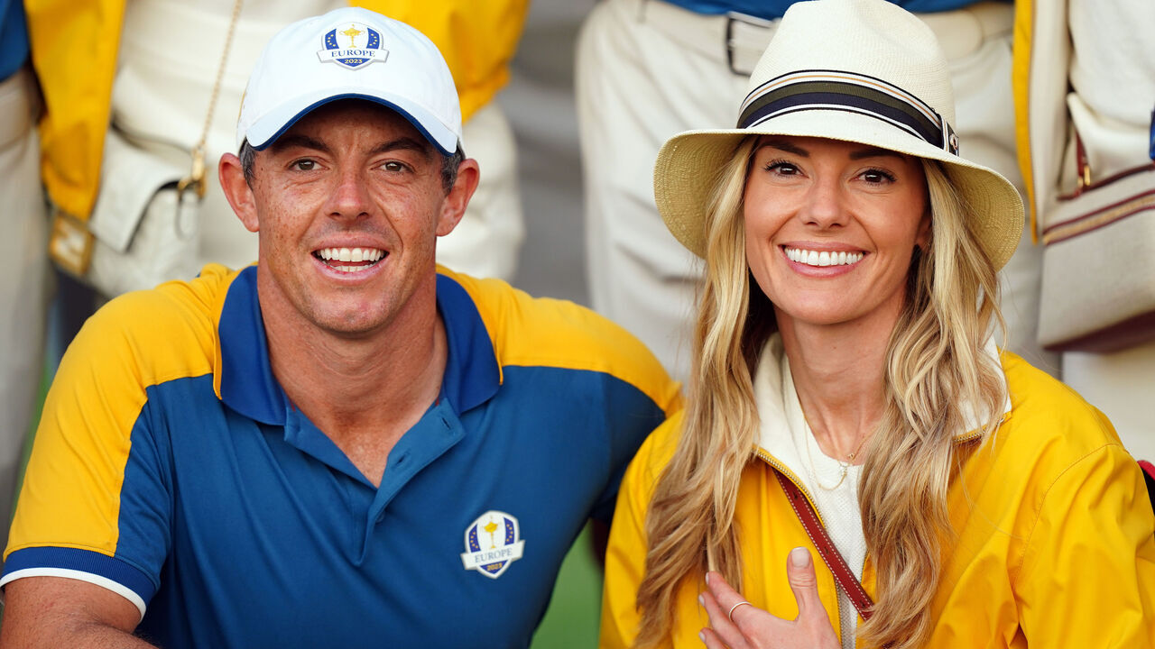 Team Europe's Rory McIlroy celebrates with his wife Erica after Europe regained the Ryder Cup following victory over the USA on day three of the 44th Ryder Cup at the Marco Simone Golf and Country Club, Rome, Italy. Picture date: Sunday October 1, 2023.