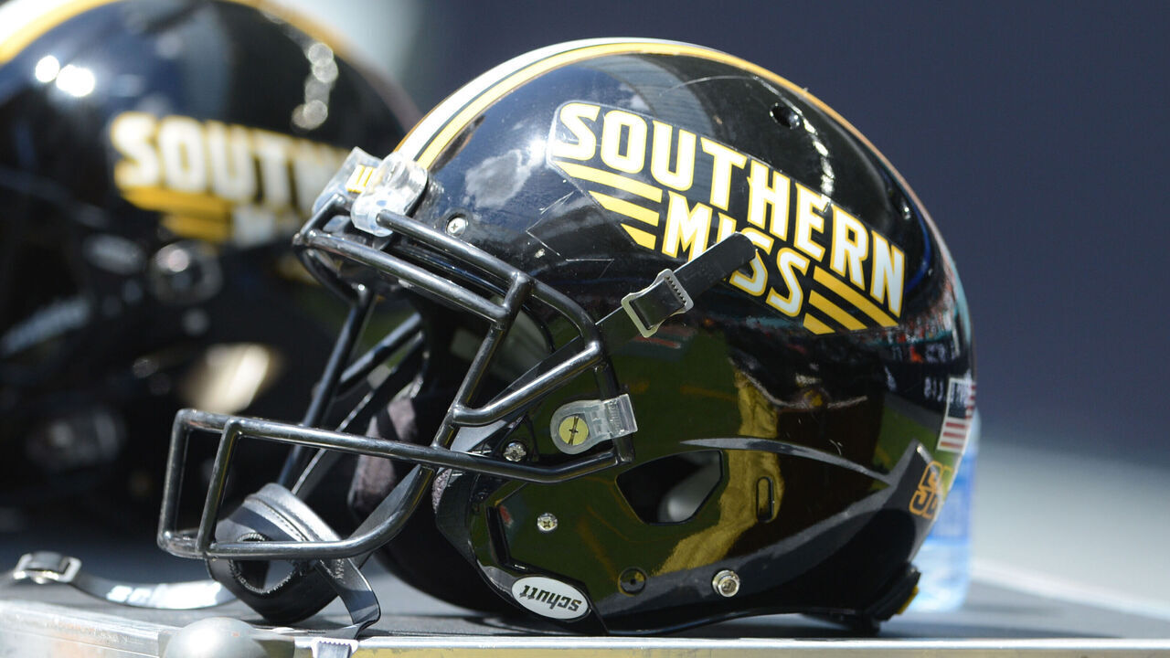 MIAMI GARDENS, FL - SEPTEMBER 10: A Southern Mississippi Golden Eagles helmet sits on the sidelines during the college football game between the Southern Miss Golden Eagles and the University of Miami Hurricanes on September 10, 2022 at the Hard Rock Stadium in Miami Gardens, FL.