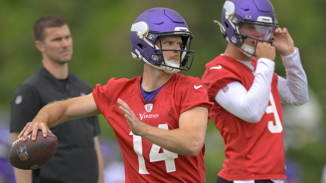 EAGAN, MN - JUNE 05: Minnesota Vikings quarterback Sam Darnold (14) makes throw during Minnesota Vikings Minicamp on June 5, 2024, at TCO Performance Center in Eagan, MN.