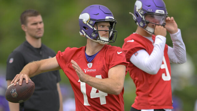 EAGAN, MN - JUNE 05: Minnesota Vikings quarterback Sam Darnold (14) makes throw during Minnesota Vikings Minicamp on June 5, 2024, at TCO Performance Center in Eagan, MN.