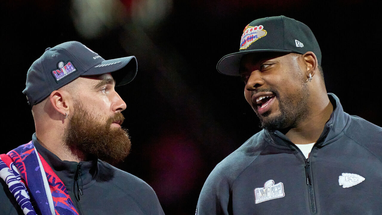 LAS VEGAS, NEVADA - FEBRUARY 5: Travis Kelce #87 speaks to Chris Jones #95 of the Kansas City Chiefs during Super Bowl LVIII Opening Night at Allegiant Stadium ahead of Super Bowl LVIII on February 5, 2024 in Las Vegas, Nevada.