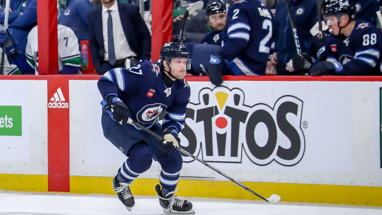 WINNIPEG, CANADA - APRIL 18: Nikolaj Ehlers #27 of the Winnipeg Jets follows the play down the ice during second period action against the Vancouver Canucks at the Canada Life Centre on April 18, 2024 in Winnipeg, Manitoba, Canada. The Jets defeated the Canucks 4-2.