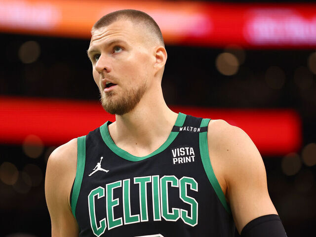 BOSTON, MASSACHUSETTS - JUNE 09: Kristaps Porzingis #8 of the Boston Celtics looks on during the first quarter against the Dallas Mavericks in Game Two of the 2024 NBA Finals at TD Garden on June 09, 2024 in Boston, Massachusetts.
