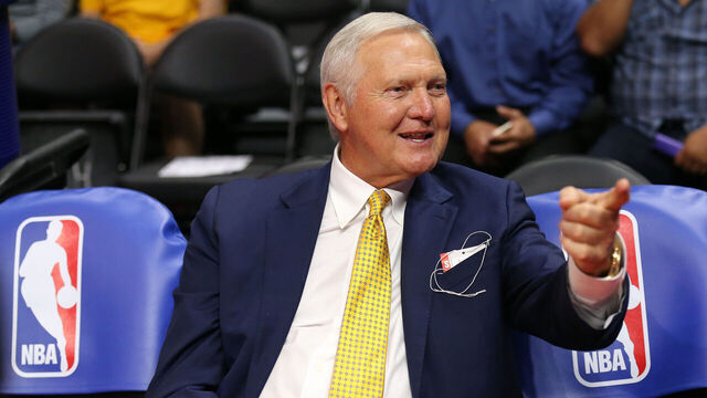 LOS ANGELES, CA - MARCH 31: Golden State Warriors executive board member Jerry West sits on the bench by NBA logos before the game the Los Angeles Clippers at Staples Center on March 31, 2015 in Los Angeles, California.