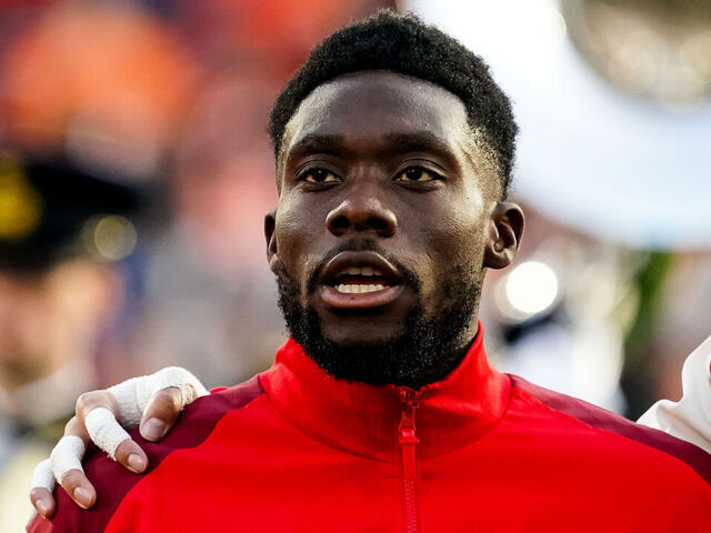 ROTTERDAM, NETHERLANDS - JUNE 6: Alphonso Davies of Canada sings along during the national anthem prior to the international friendly match between Netherlands and Canada at De Kuip on June 6, 2024 in Rotterdam, Netherlands.