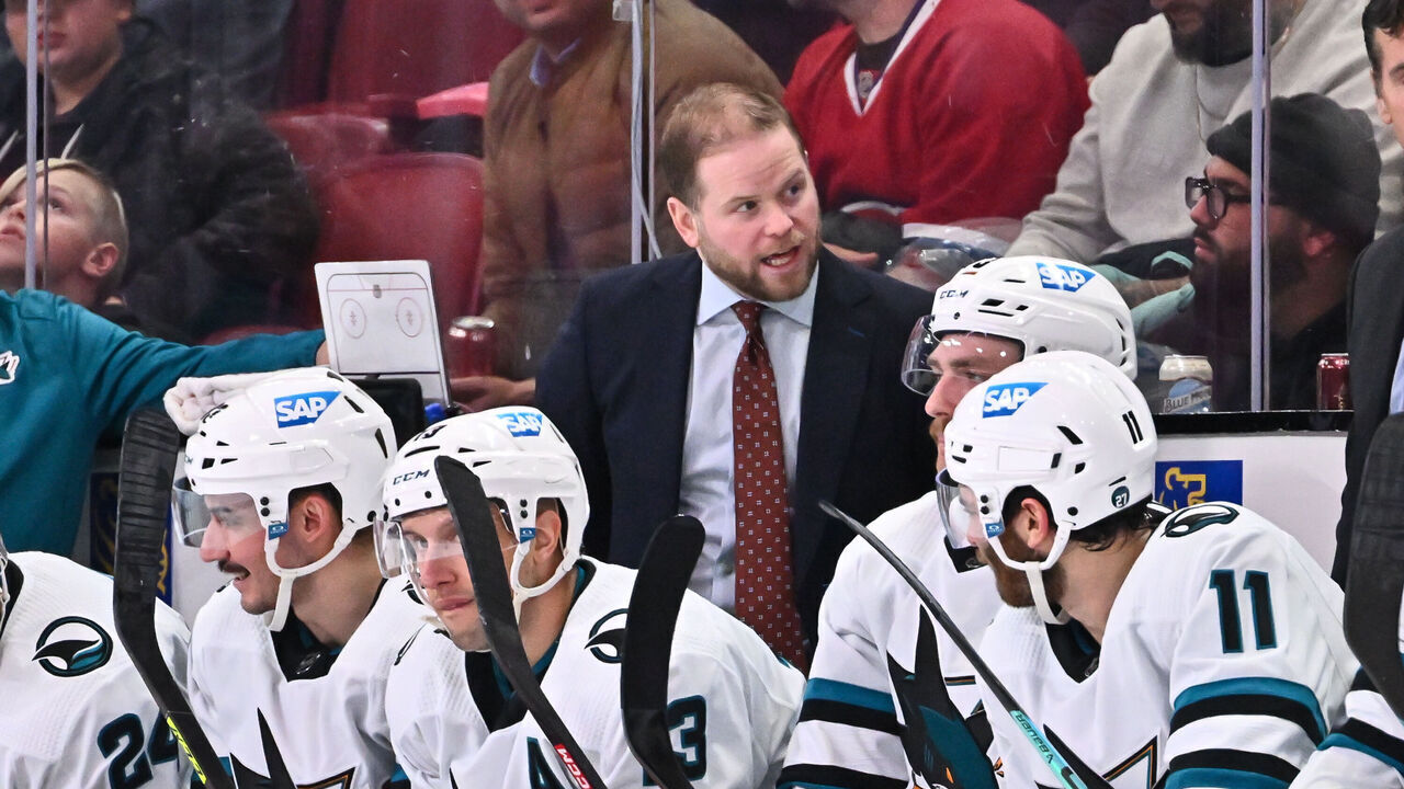 MONTREAL, CANADA - NOVEMBER 29: Assistant coach Ryan Warsofsky of the San Jose Sharks handles bench duties during the third period against the Montreal Canadiens at Centre Bell on November 29, 2022 in Montreal, Quebec, Canada. The San Jose Sharks defeated the Montreal Canadiens 4-0.