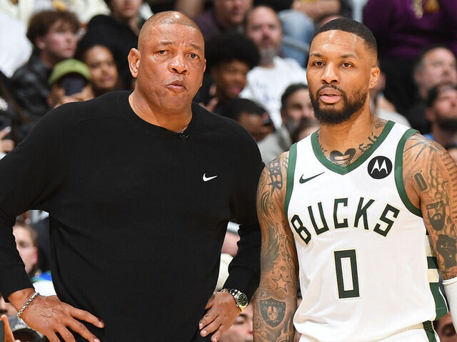 LOS ANGELES, CA - MARCH 8: Head Coach Doc Rivers and Damian Lillard #0 of the Milwaukee Bucks look on during the game against the Los Angeles Lakers on March 8, 2024 at Crypto.Com Arena in Los Angeles, California. NOTE TO USER: User expressly acknowledges and agrees that, by downloading and/or using this Photograph, user is consenting to the terms and conditions of the Getty Images License Agreement. Mandatory Copyright Notice: Copyright 2024 NBAE