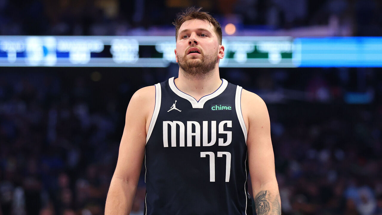DALLAS, TEXAS - JUNE 12: Luka Dončić #77 of the Dallas Mavericks walks across the court in the second quarter against the Boston Celtics in Game Three of the 2024 NBA Finals at American Airlines Center on June 12, 2024 in Dallas, Texas.