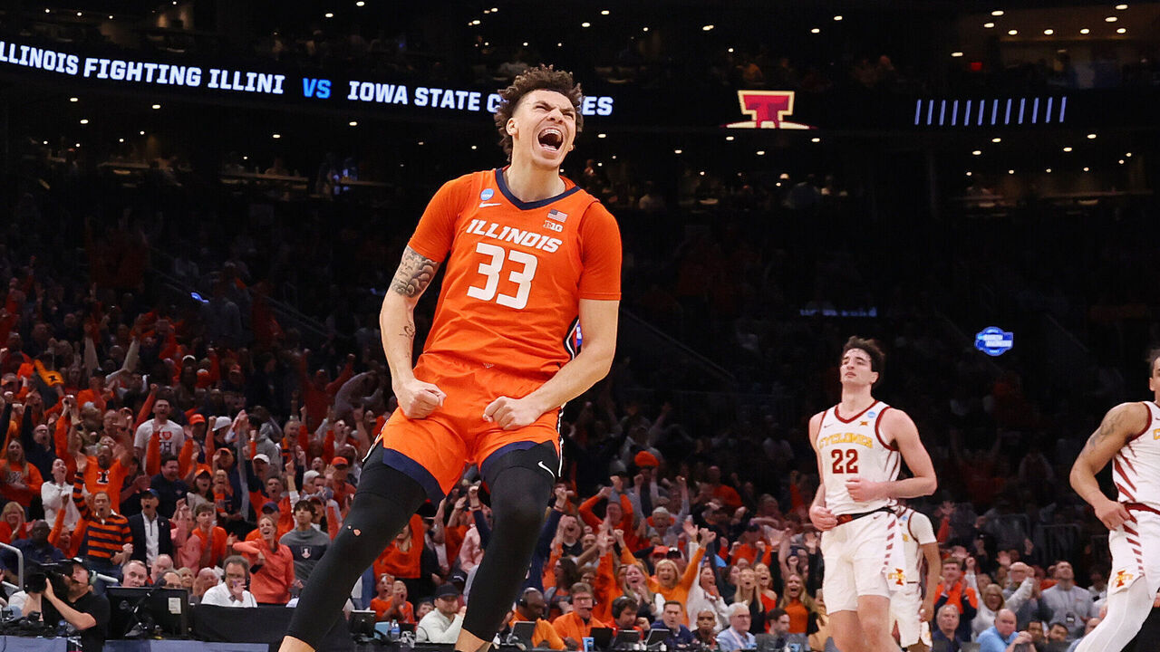 BOSTON, MASSACHUSETTS - MARCH 28: Coleman Hawkins #33 of the Illinois Fighting Illini celebrates a dunk by Terrence Shannon Jr. #0 against the Iowa State Cyclones during the first half at TD Garden on March 28, 2024 in Boston, Massachusetts.