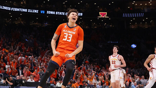 BOSTON, MASSACHUSETTS - MARCH 28: Coleman Hawkins #33 of the Illinois Fighting Illini celebrates a dunk by Terrence Shannon Jr. #0 against the Iowa State Cyclones during the first half at TD Garden on March 28, 2024 in Boston, Massachusetts.