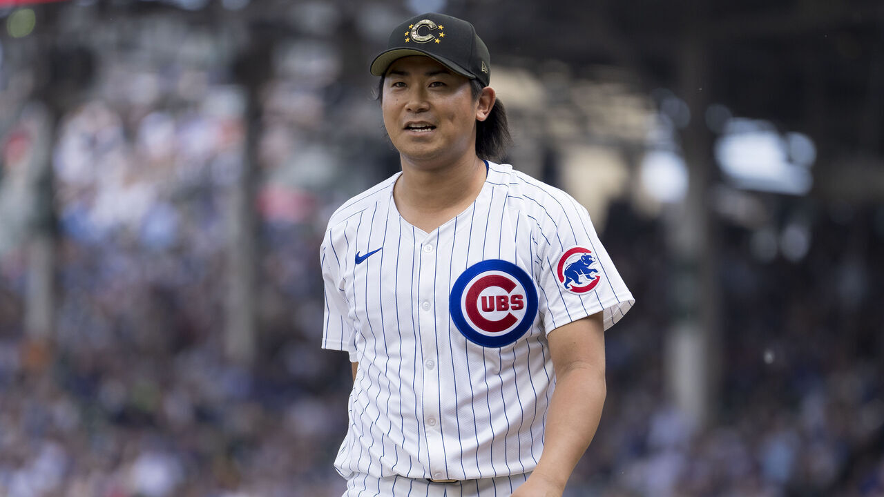 CHICAGO, IL - May 18: Shota Imanaga of the Chicago Cubs reacts as he exits the field of play during a game against the Pittsburgh Pirates at Wrigley Field on May 18, 2024 in Chicago, Illinois.