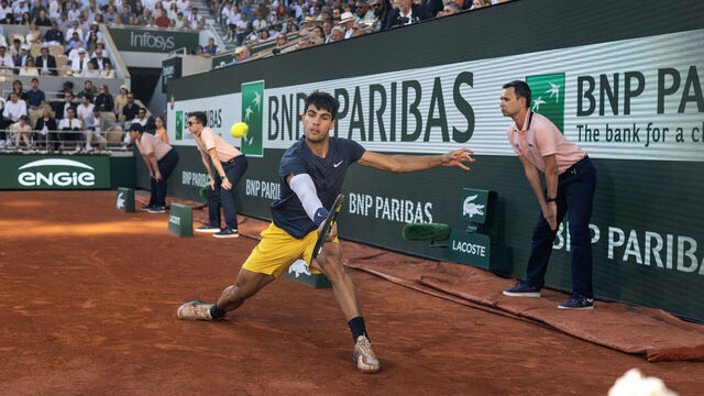 PARIS, FRANCE - June 09: A general view of Carlos Alcaraz of Spain in action against Alexander Zverev of Germany on Court Philippe-Chatrier during the Men's Singles Final at the 2024 French Open Tennis Tournament at Roland Garros on June 9th, 2024, in Paris, France.