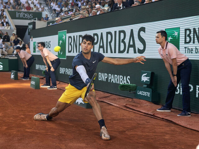 PARIS, FRANCE - June 09: A general view of Carlos Alcaraz of Spain in action against Alexander Zverev of Germany on Court Philippe-Chatrier during the Men's Singles Final at the 2024 French Open Tennis Tournament at Roland Garros on June 9th, 2024, in Paris, France.