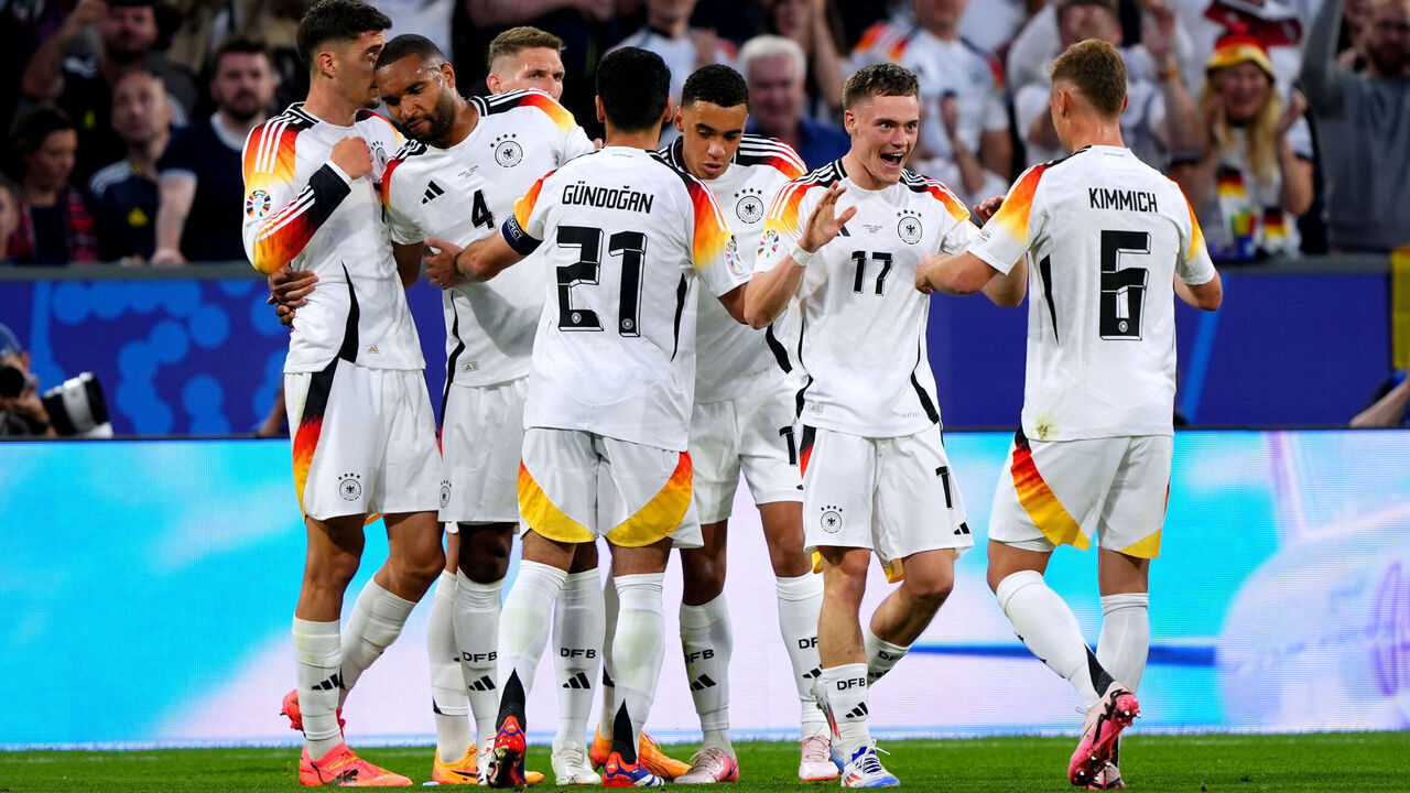 Germany's Florian Wirtz (second right) celebrates with team-mates after scoring their side's first goal of the game during the UEFA Euro 2024 Group A match at the Munich Football Arena in Munich, Germany. Picture date: Friday June 14, 2024.