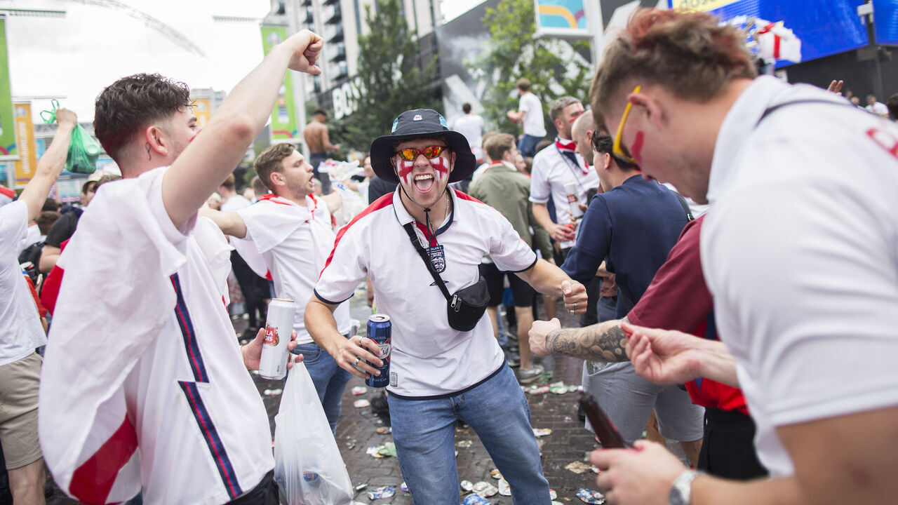 LONDON, ENGLAND - JULY 11: England fans enjoy some beers before the UEFA Euro 2020 Championship Final between Italy and England at Wembley Stadium on July 11, 2021 in London, United Kingdom.