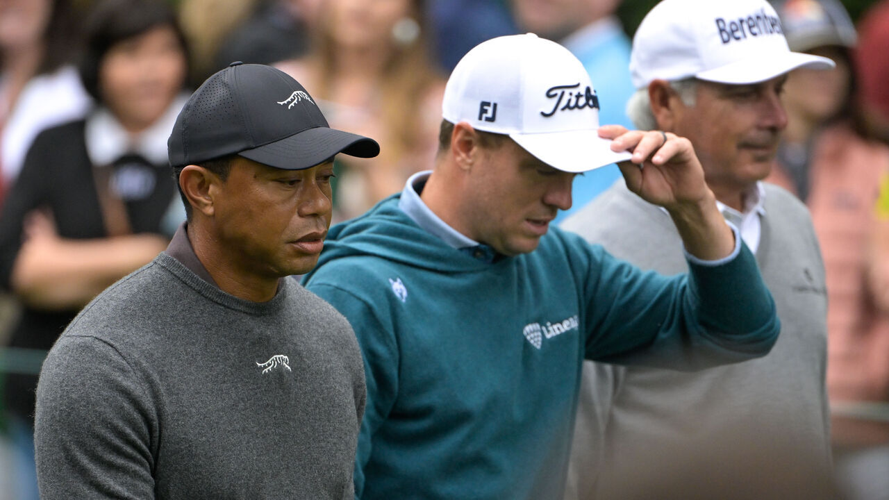 AUGUSTA, GEORGIA - APRIL 09: Tiger Woods, Justin Thomas and Fred Couples walk along the seventh tee box together prior to Masters Tournament at Augusta National Golf Club on April 9, 2024 in AUGUSTA, Georgia.