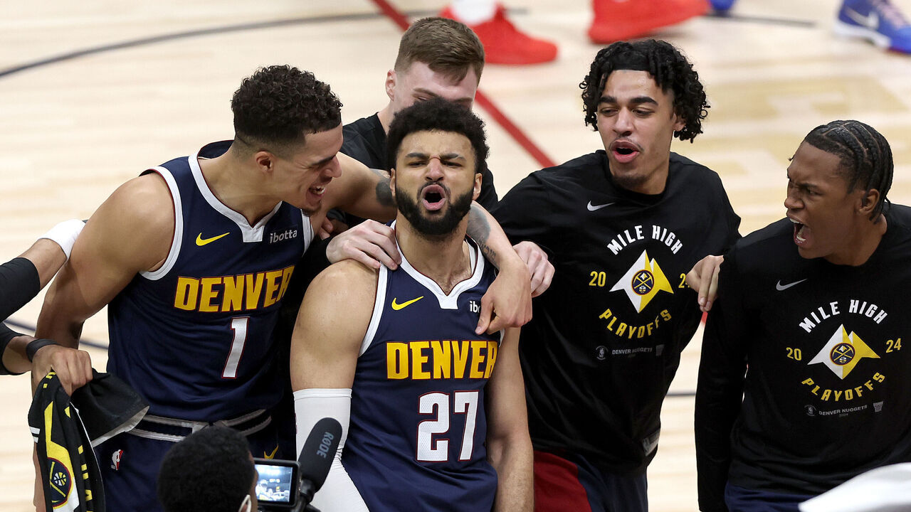 DENVER, COLORADO - APRIL 29: Jamal Murray #27 of the Denver Nuggets celebrates with his teammates after making a basket in the final seconds tom defeat the Los Angeles Lakers during game five of the Western Conference First Round Playoffs at Ball Arena on April 29, 2024 in Denver, Colorado.